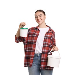 Photo of Portrait of young decorator with paint roller and bucket on white background