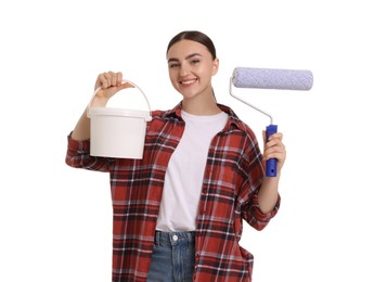 Photo of Portrait of young decorator with paint roller and bucket on white background