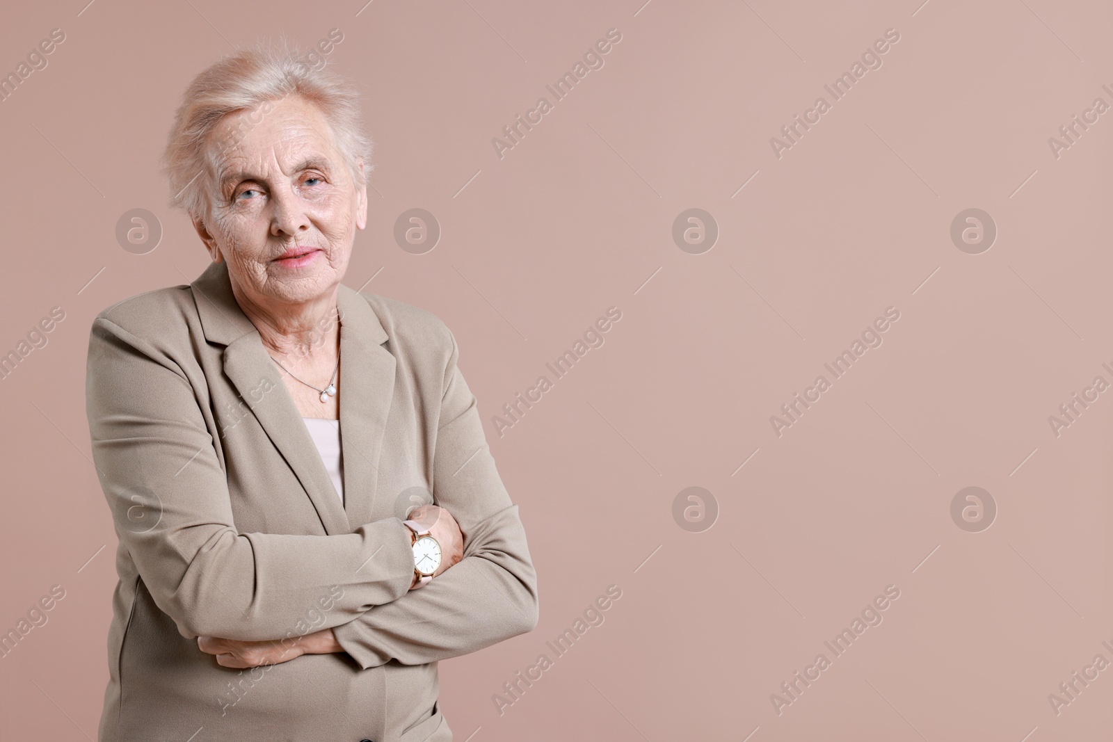 Photo of Portrait of senior woman on color background. Space for text