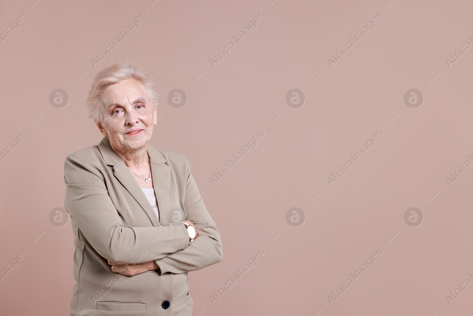 Photo of Portrait of senior woman on color background. Space for text