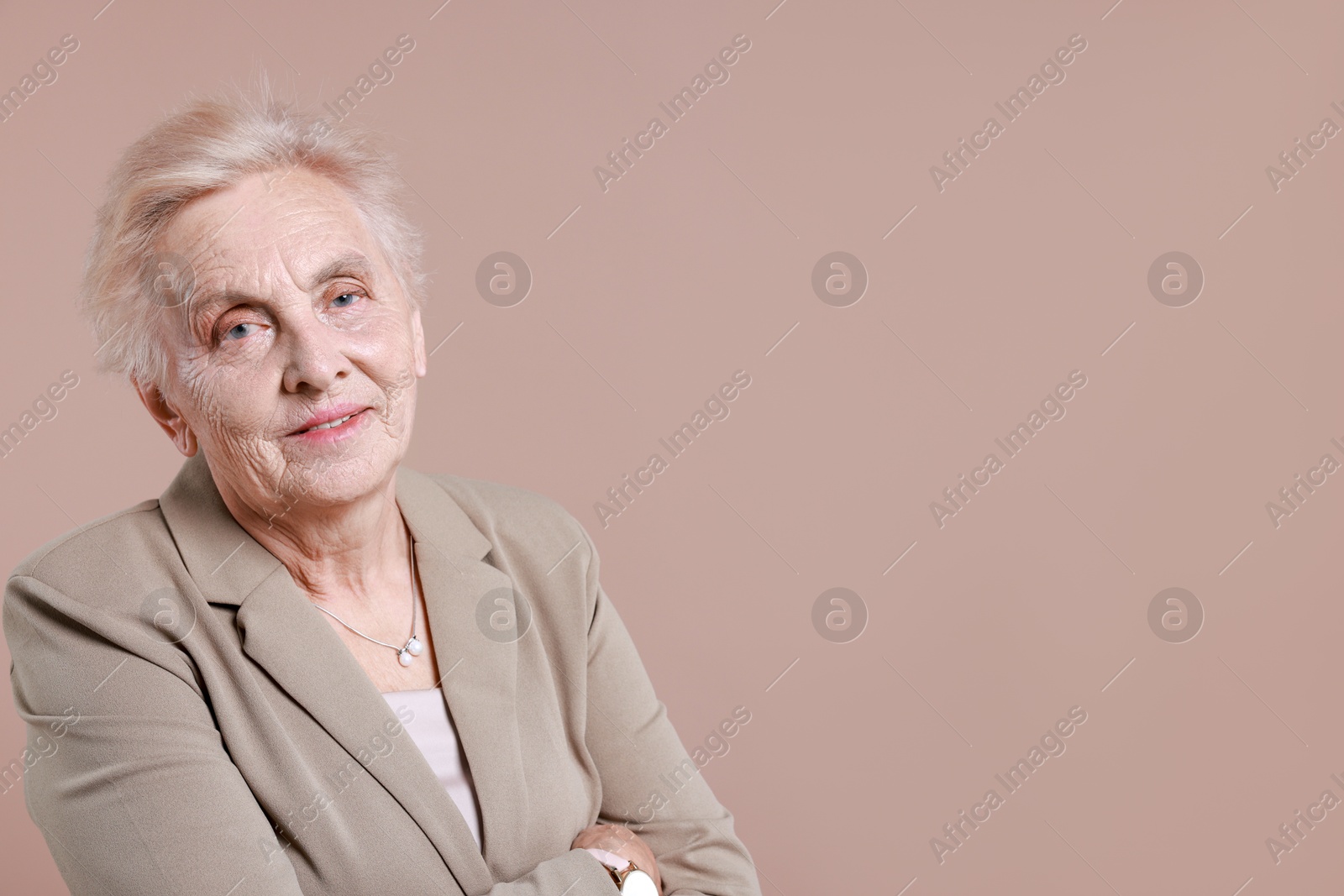 Photo of Portrait of senior woman on color background. Space for text