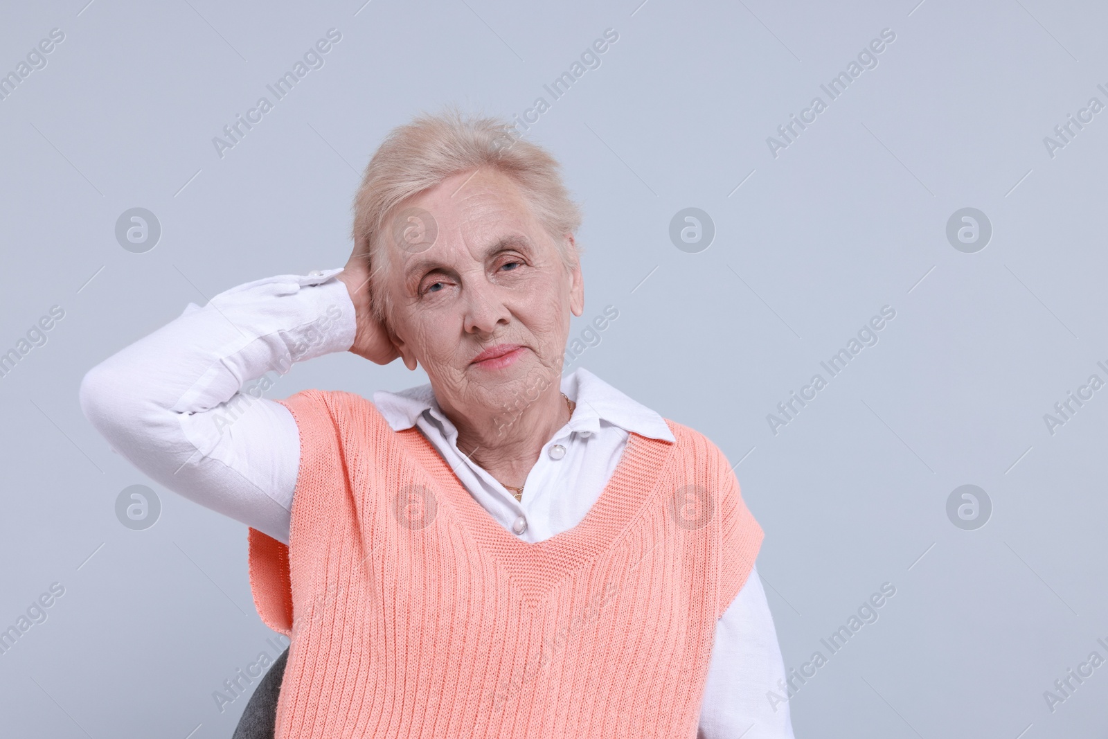 Photo of Portrait of senior woman on light background