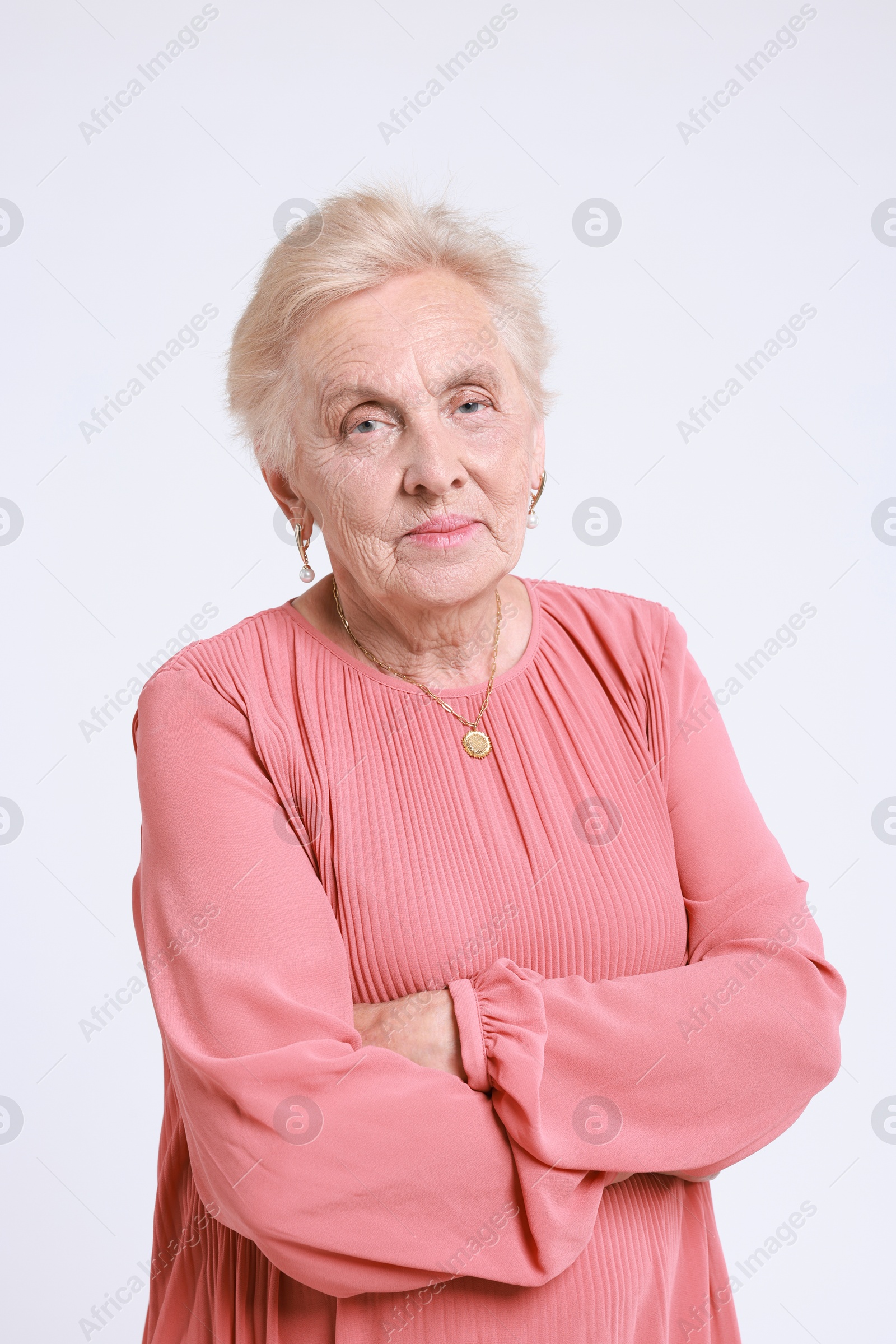 Photo of Portrait of senior woman on white background