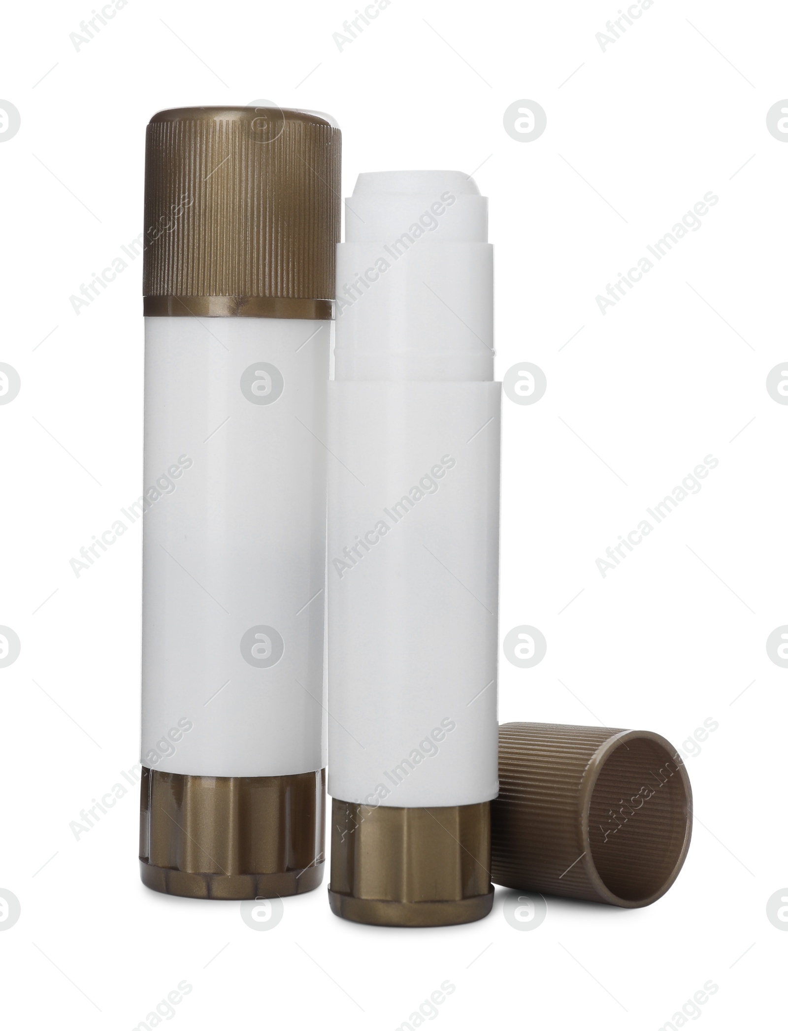 Photo of Two glue sticks with caps isolated on white