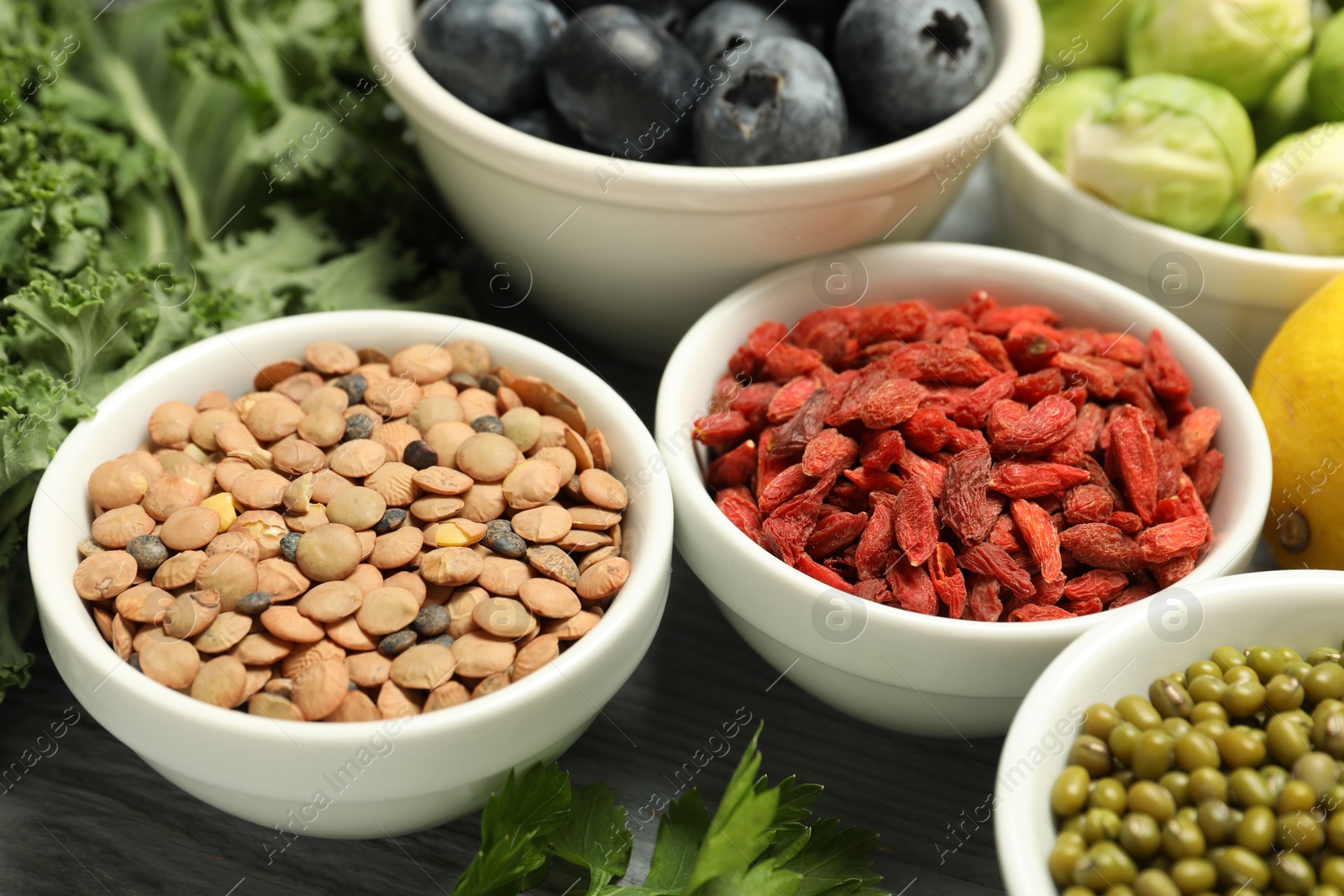 Photo of Superfood. Different healthy food products on table, closeup