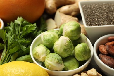 Photo of Superfood. Different healthy food products on table, closeup