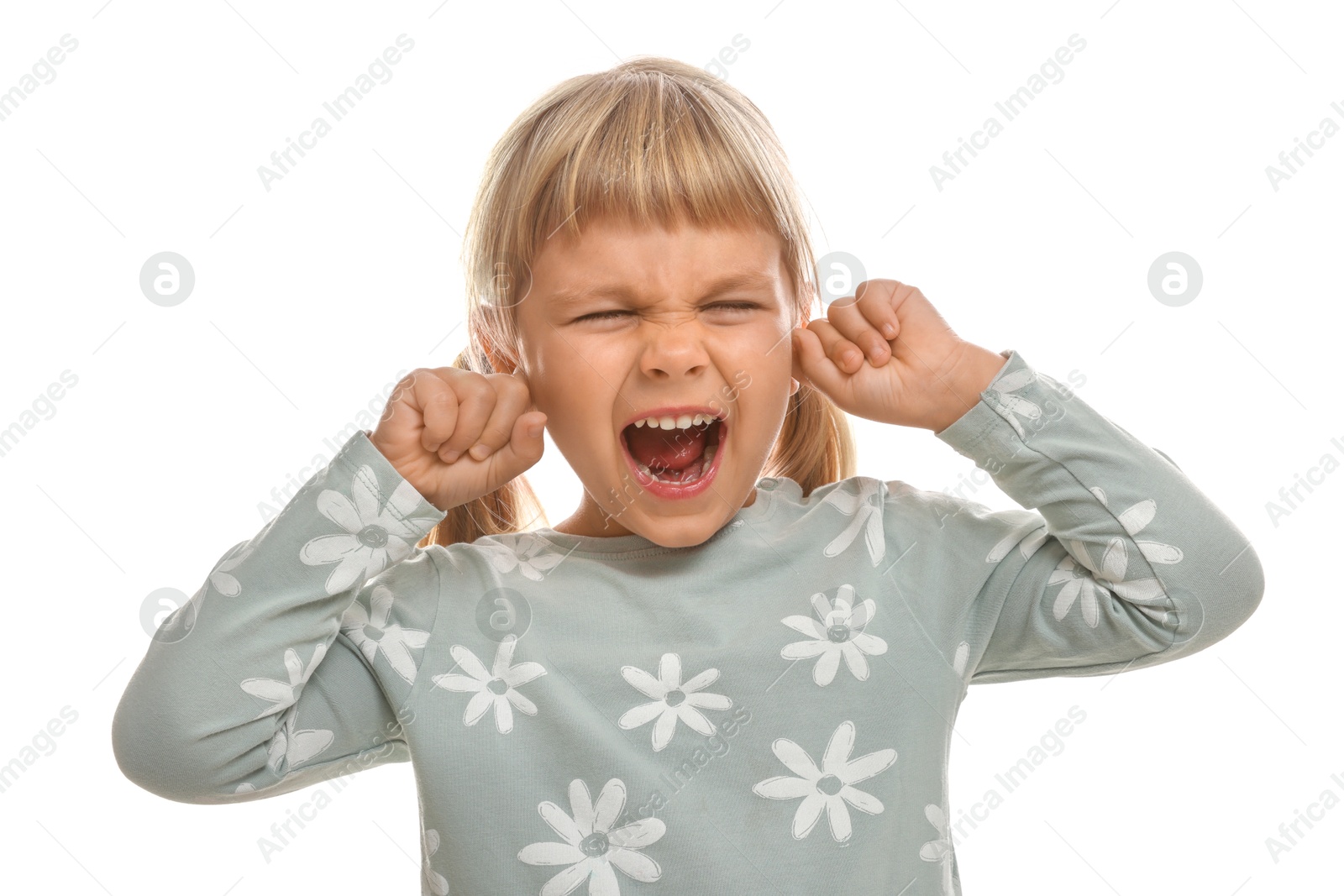 Photo of Little girl covering her ears with fingers on white background