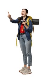 Young tourist with camera and backpack on white background