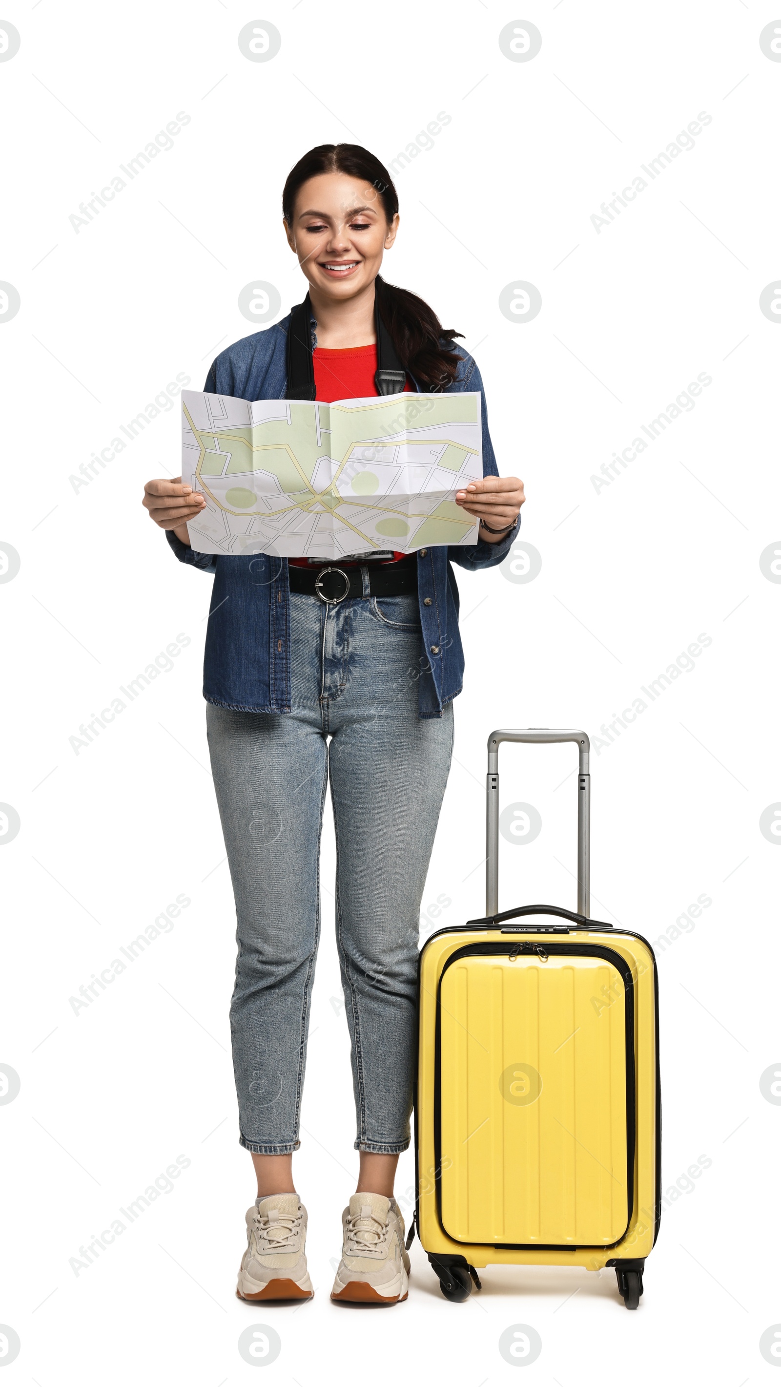 Photo of Young tourist with suitcase on white background