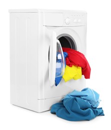 Photo of Modern washing machine with colorful laundry isolated on white