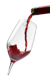 Photo of Pouring red wine into glass isolated on white