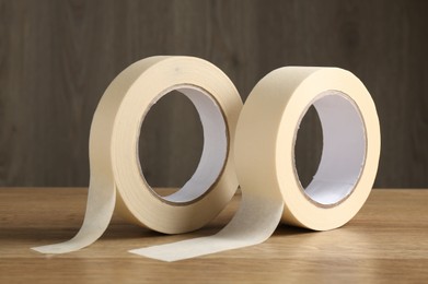 Rolls of masking tape on wooden table