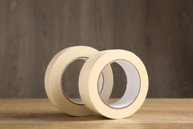 Photo of Rolls of masking tape on wooden table