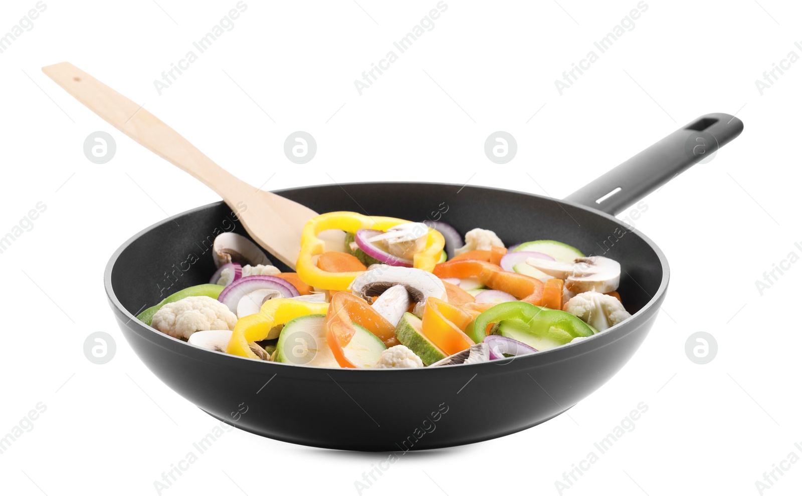 Photo of Frying pan with mix of vegetables and mushrooms in air isolated on white