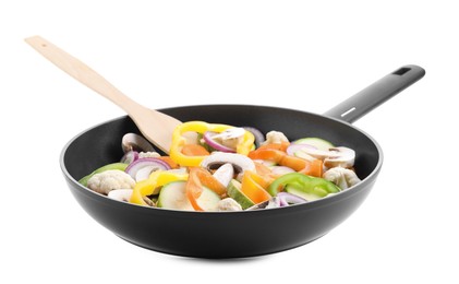 Photo of Frying pan with mix of vegetables and mushrooms in air isolated on white