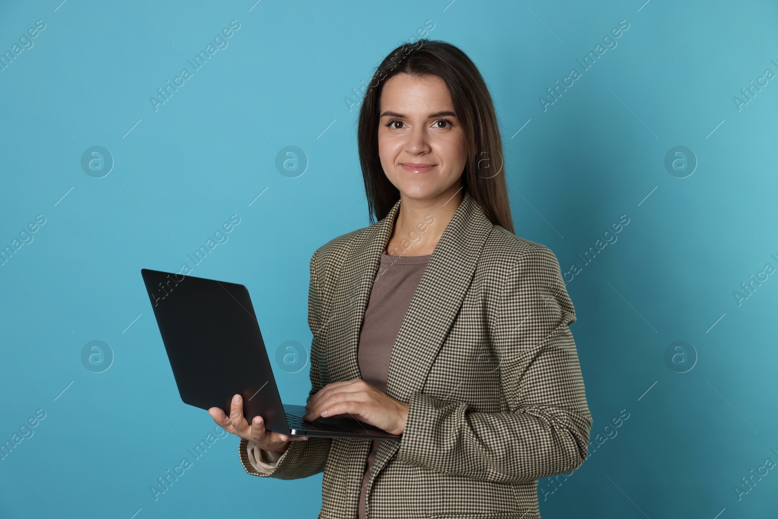 Photo of Banker with laptop on light blue background