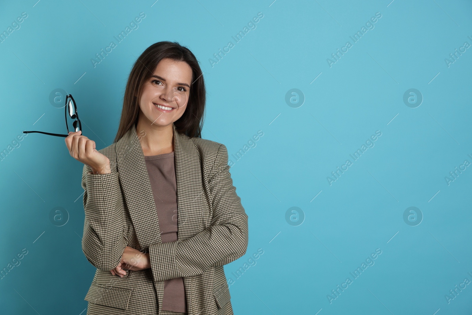 Photo of Banker with glasses on light blue background, space for text