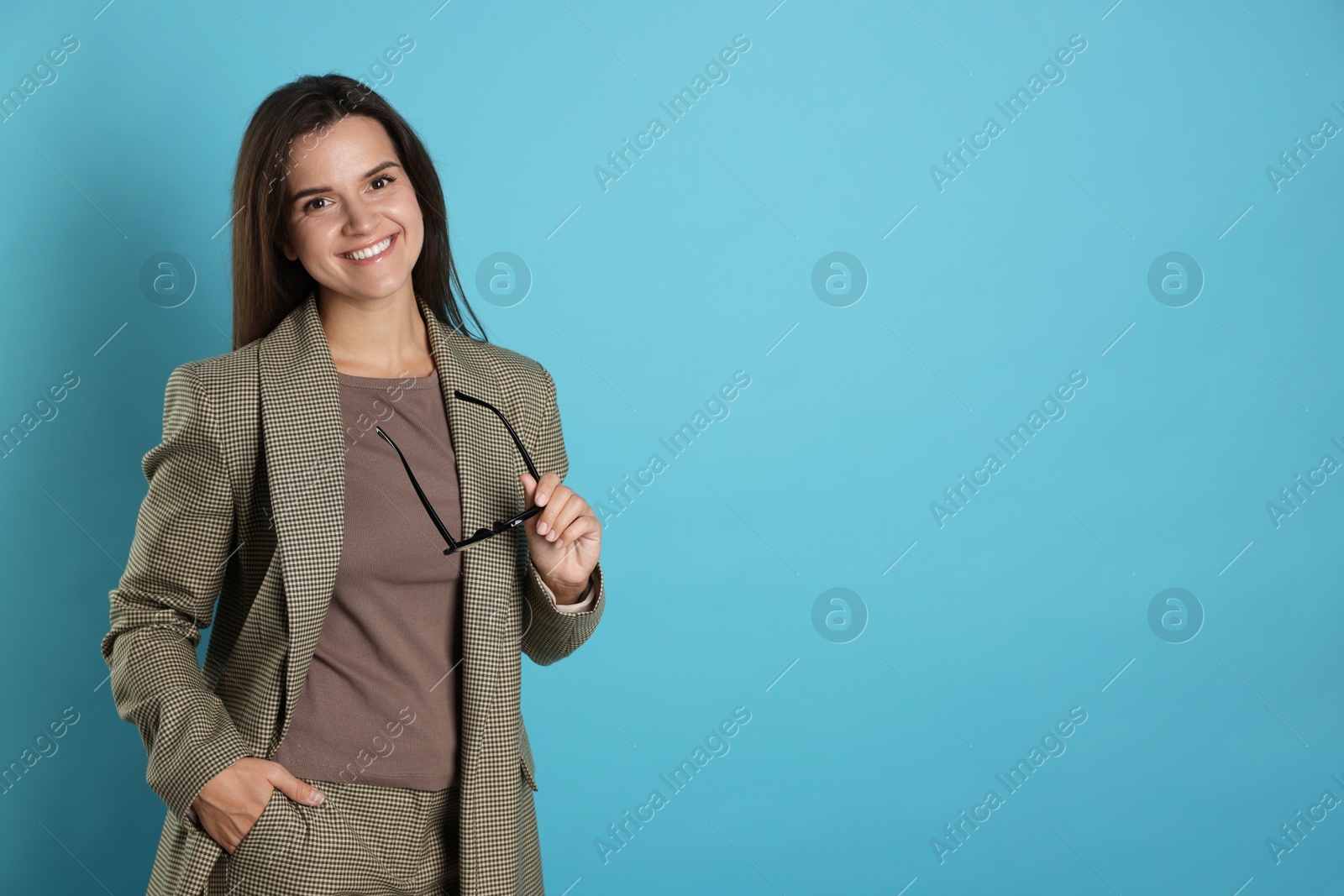 Photo of Banker with glasses on light blue background, space for text