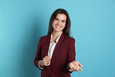 Portrait of banker on light blue background