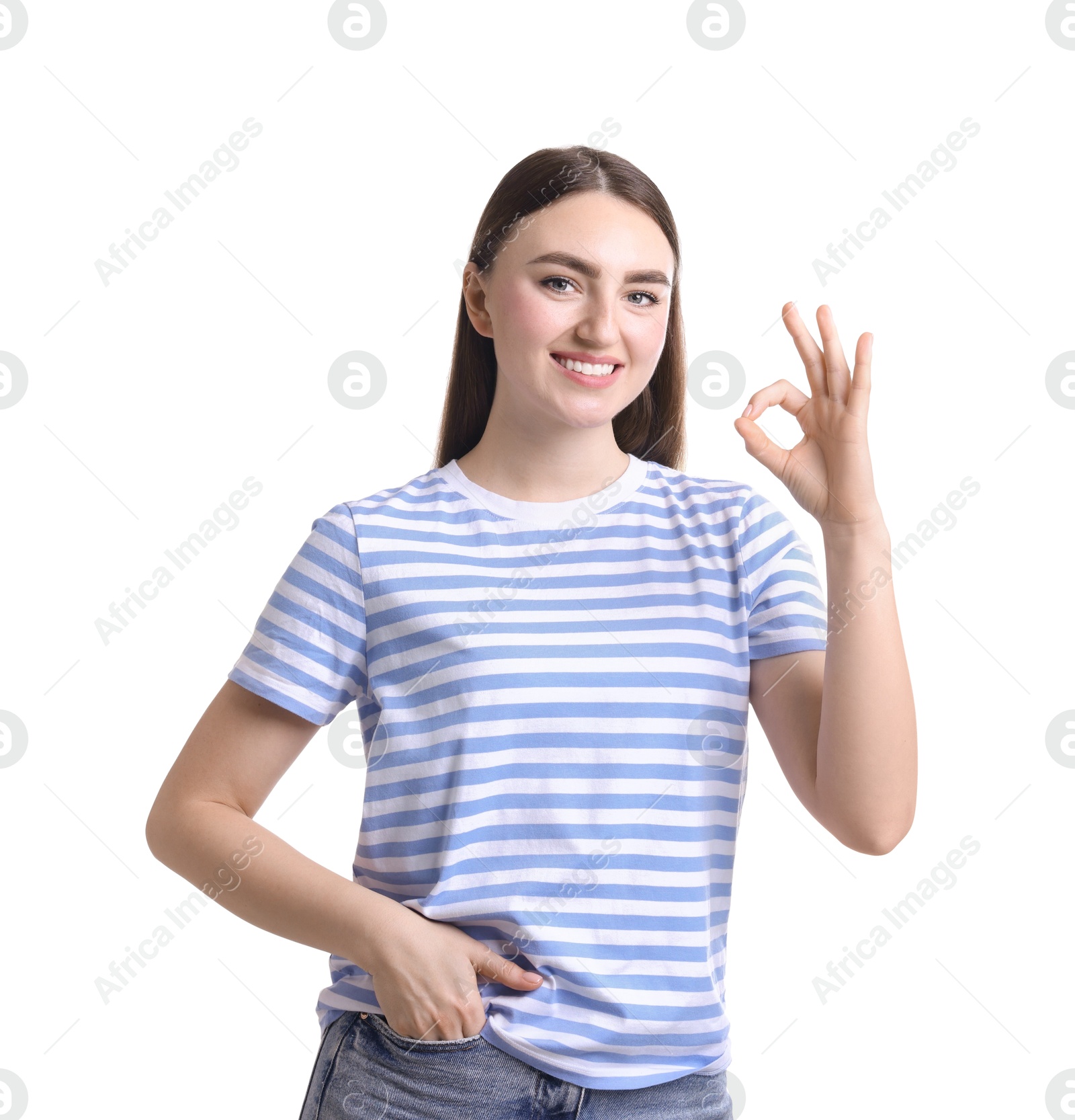 Photo of Happy young woman showing OK gesture on white background