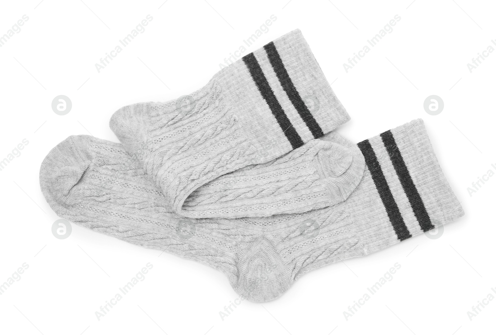 Photo of Pair of soft socks isolated on white, top view