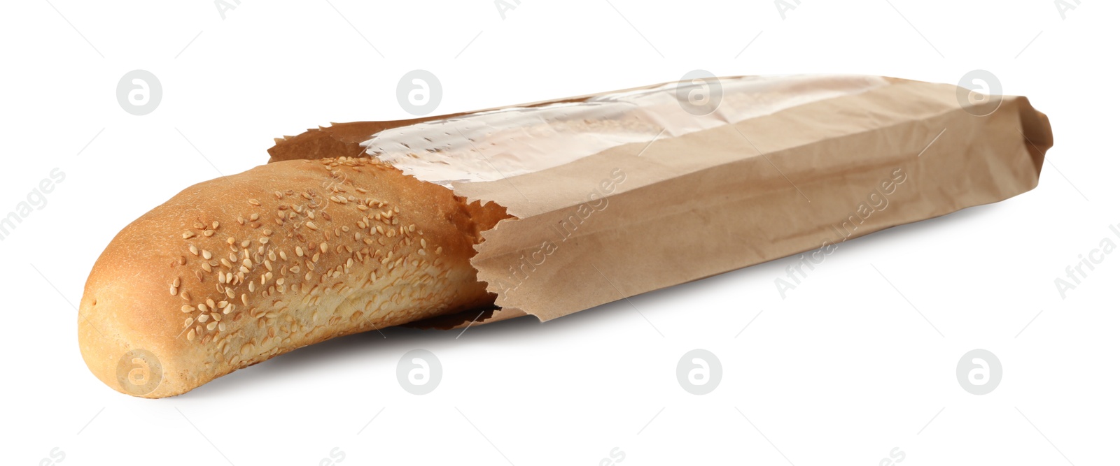 Photo of Fresh baguette with sesame in paper bag isolated on white