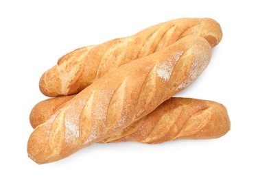 Photo of Three freshly baked baguettes isolated on white, top view