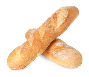 Photo of Two freshly baked baguettes isolated on white