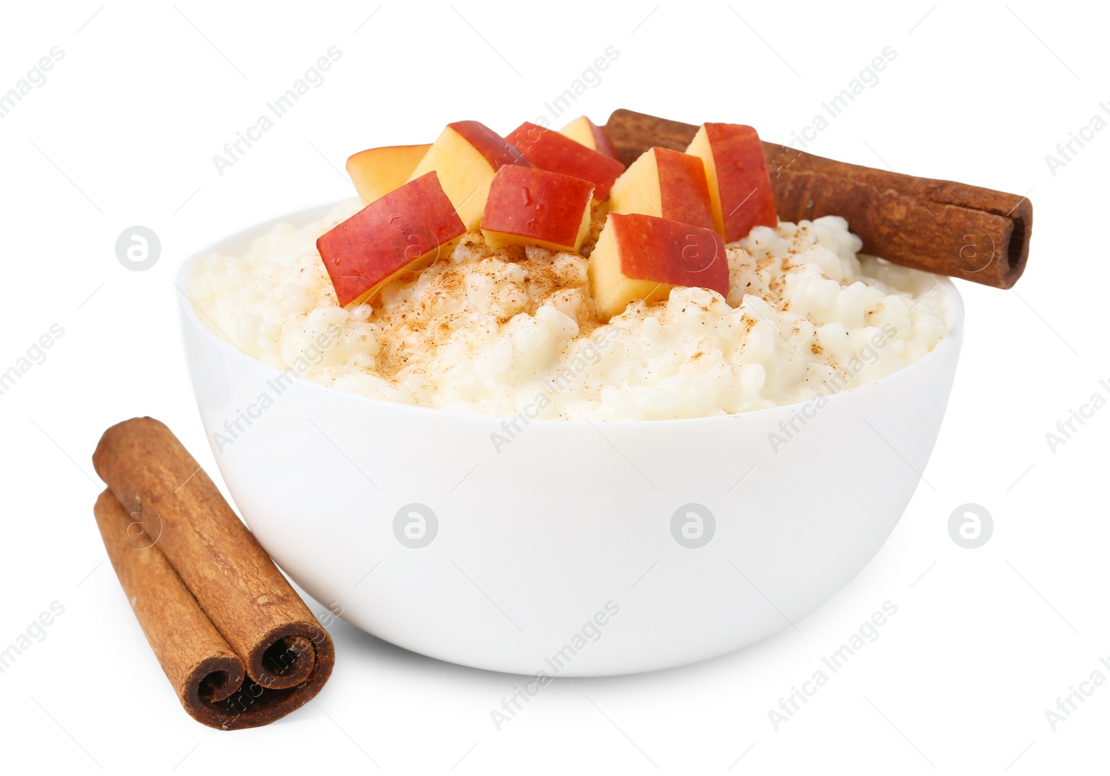 Photo of Delicious rice pudding with apples and cinnamon isolated on white