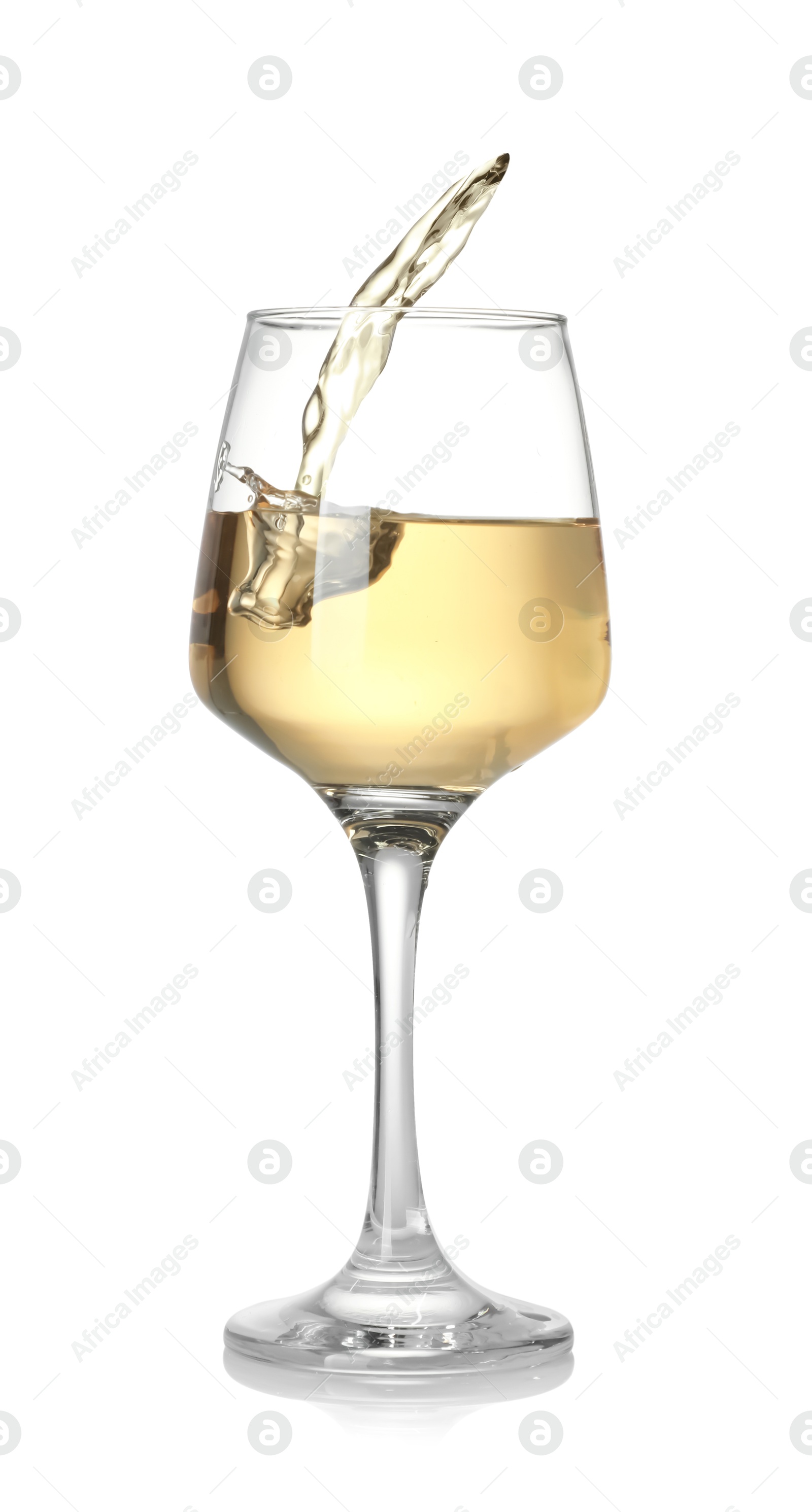 Photo of Tasty wine splashing in glass on white background