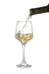 Photo of Pouring wine into glass on white background