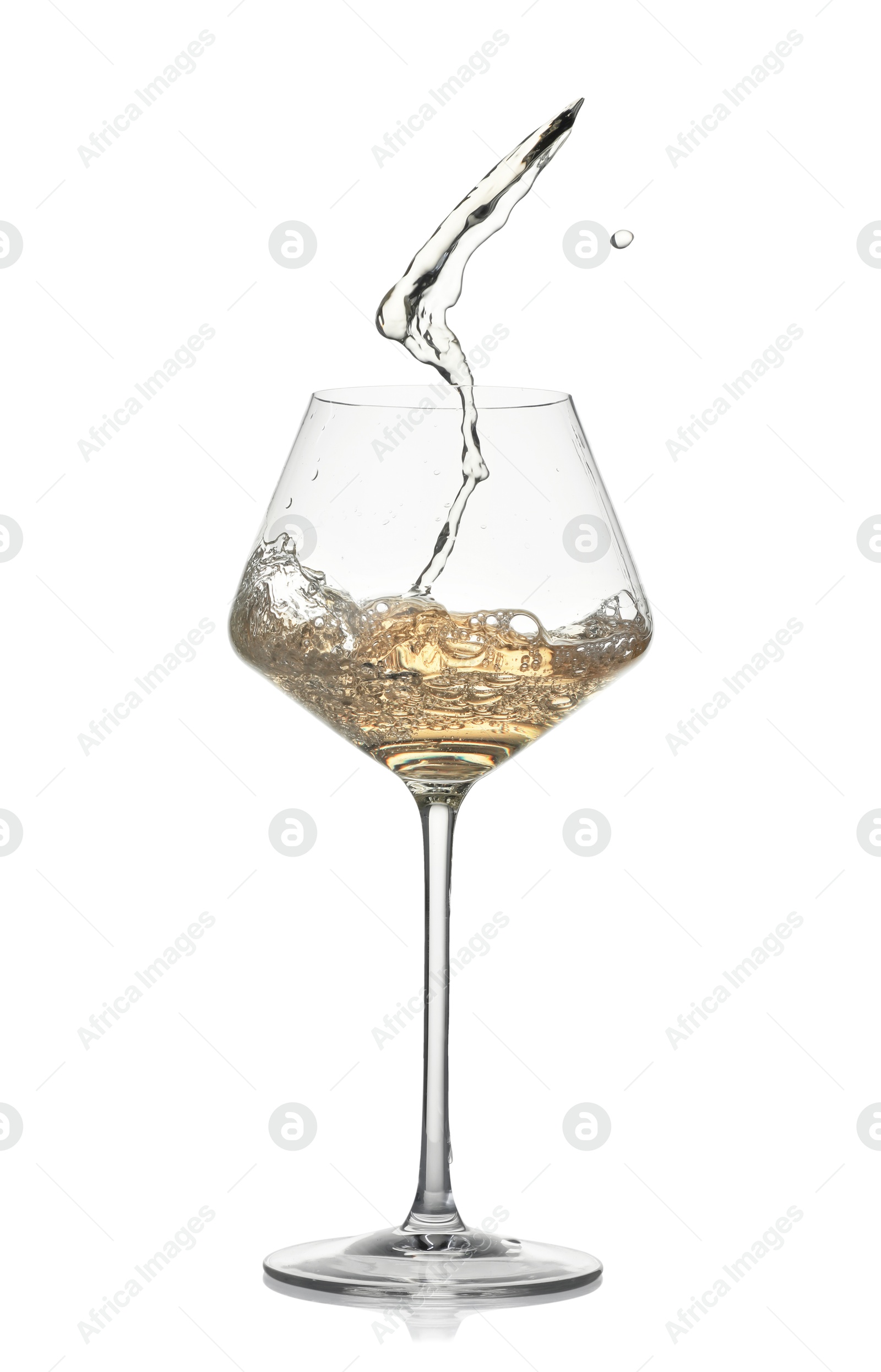 Photo of Tasty wine splashing in glass on white background