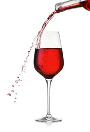 Photo of Pouring wine into glass on white background