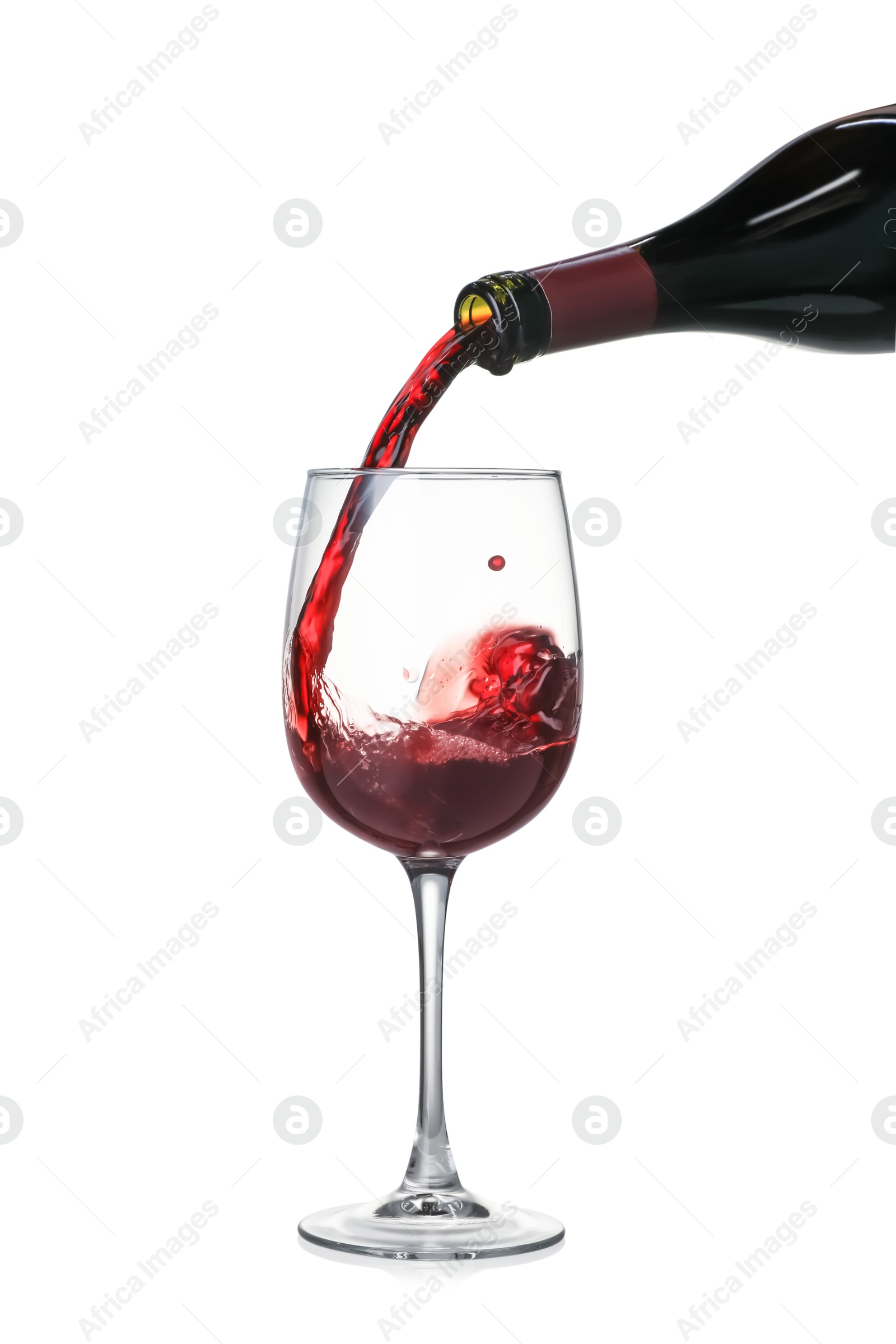 Photo of Pouring wine into glass on white background