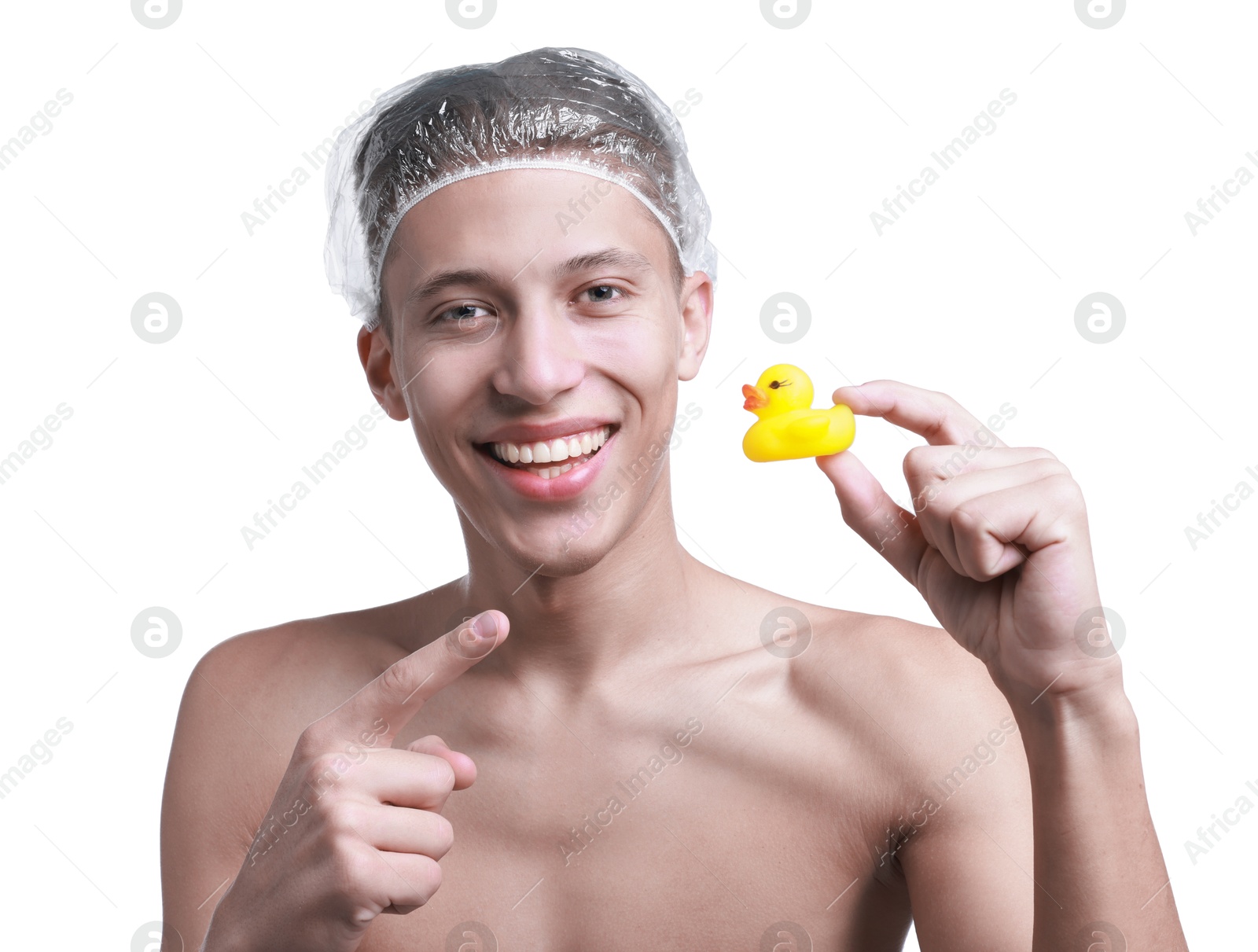 Photo of Happy man in shower cap with bath duck on white background