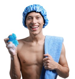 Photo of Happy man in shower cap with towel and mesh sponge on white background