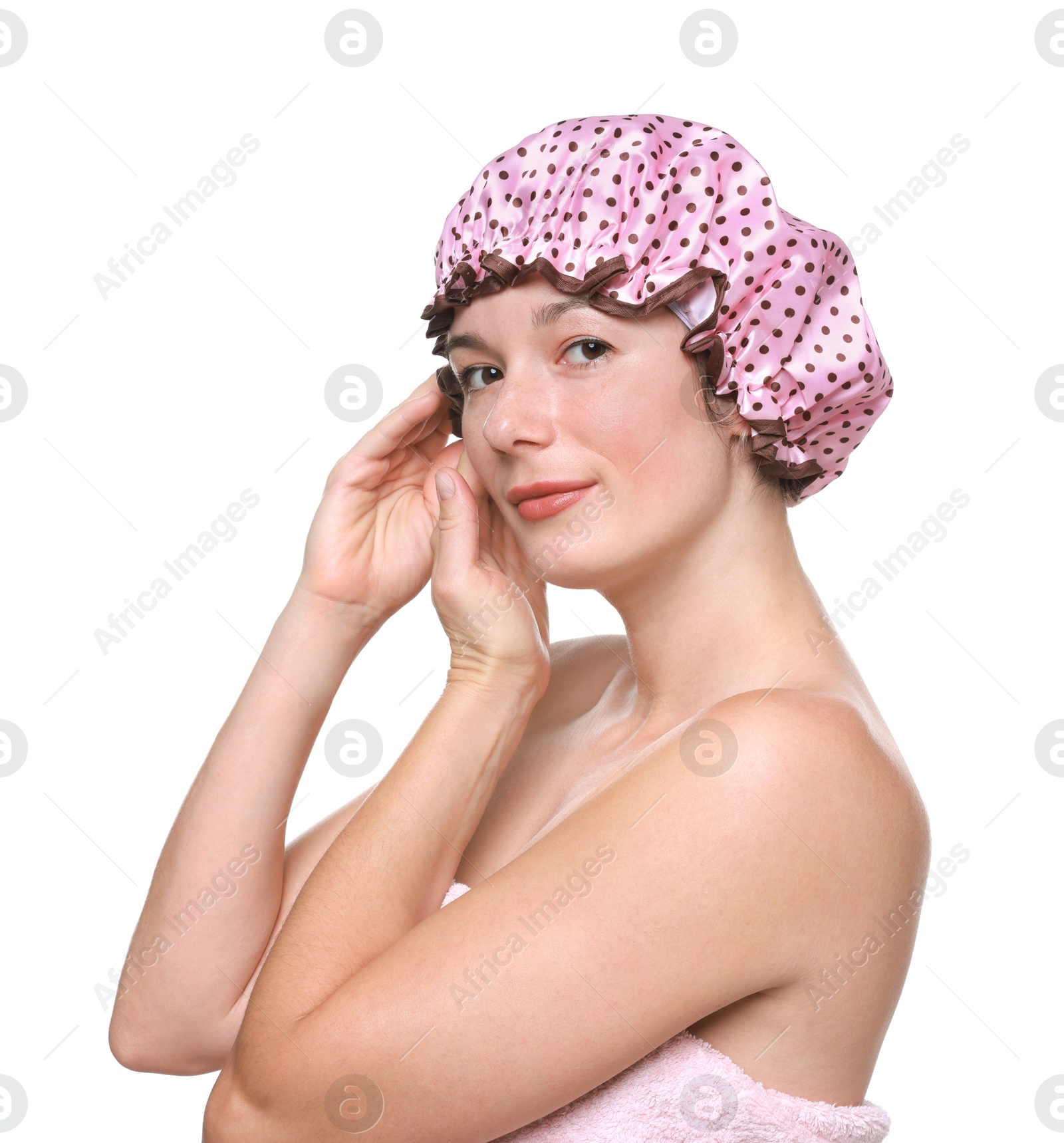 Photo of Woman wearing pink shower cap on white background