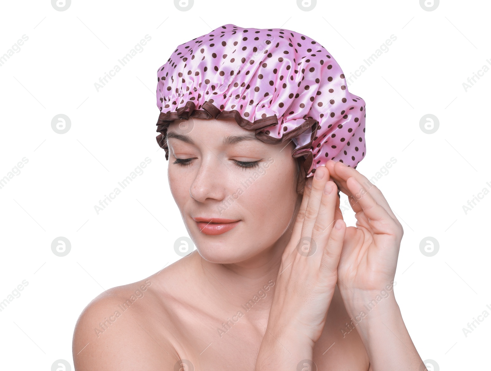 Photo of Woman wearing pink shower cap on white background