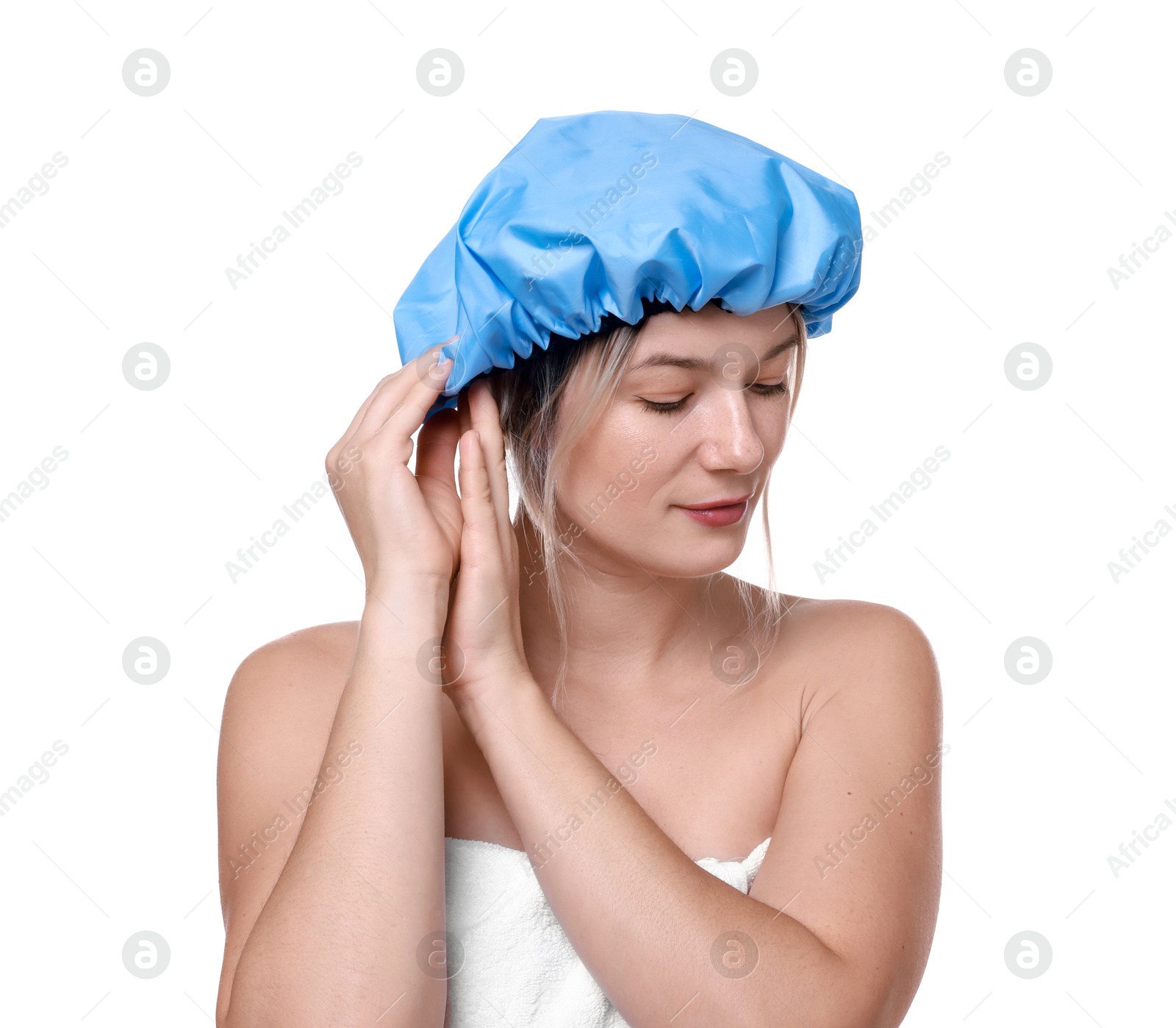 Photo of Woman wearing blue shower cap on white background