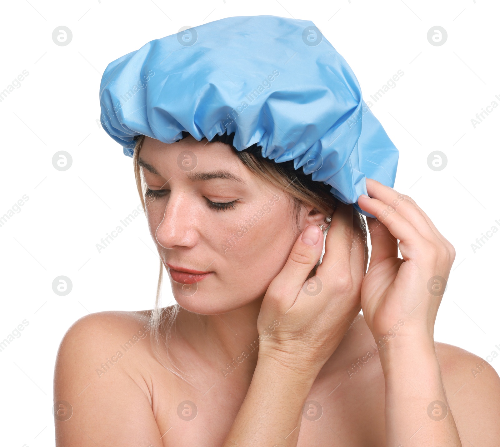 Photo of Woman wearing blue shower cap on white background