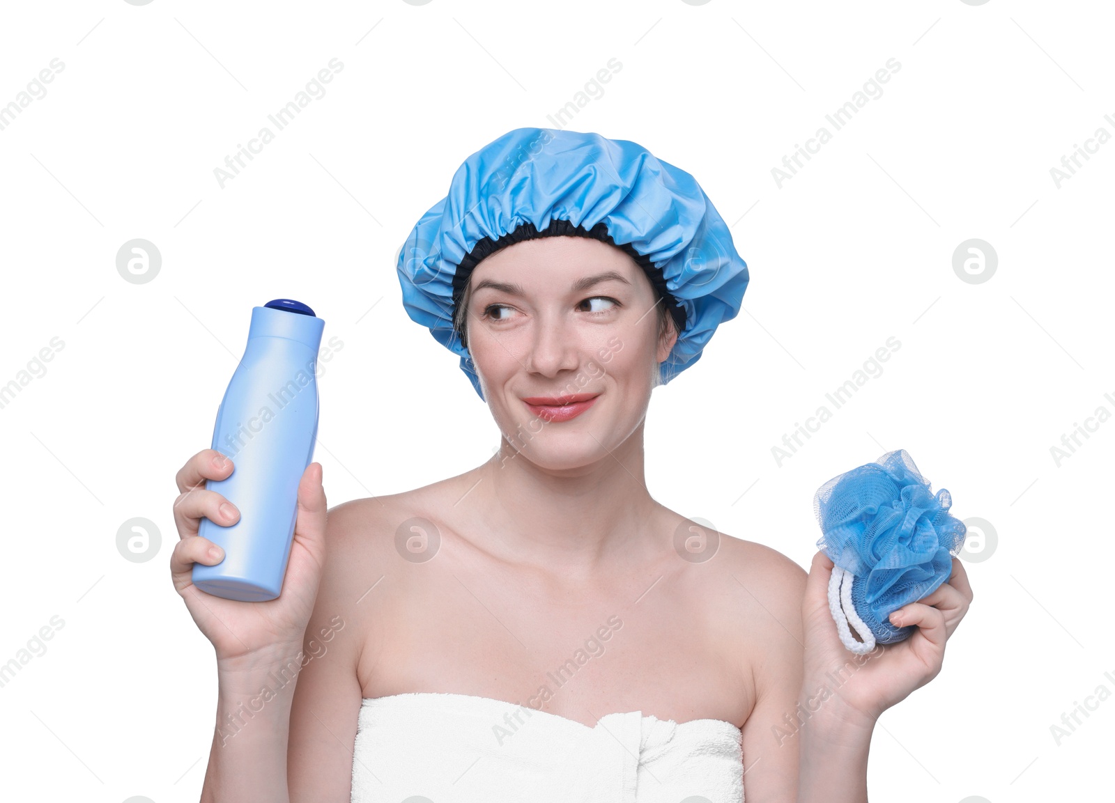 Photo of Woman with blue shower cap, mesh sponge and shampoo on white background