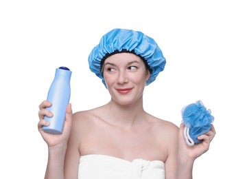 Photo of Woman with blue shower cap, mesh sponge and shampoo on white background