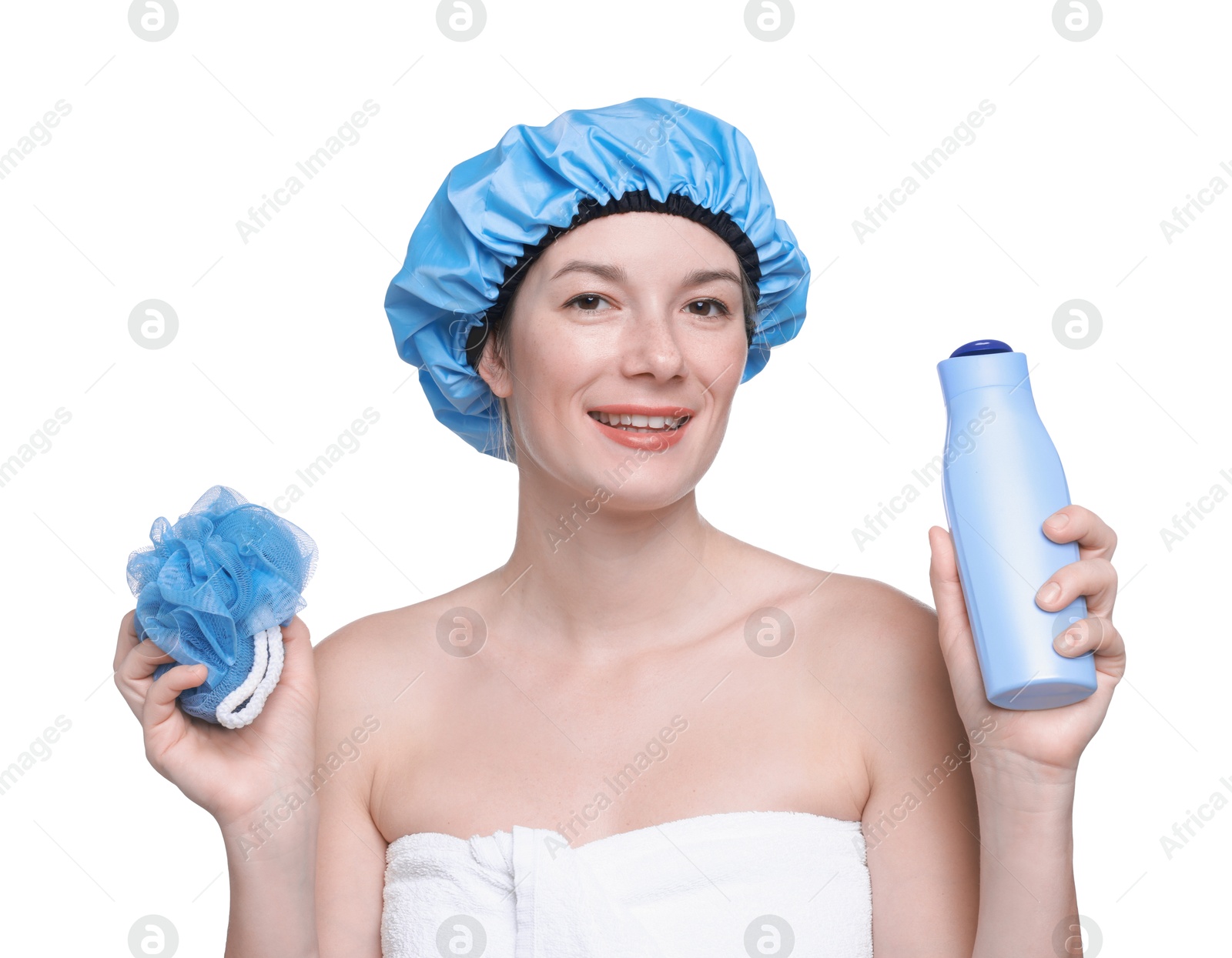 Photo of Woman with blue shower cap, mesh sponge and shampoo on white background