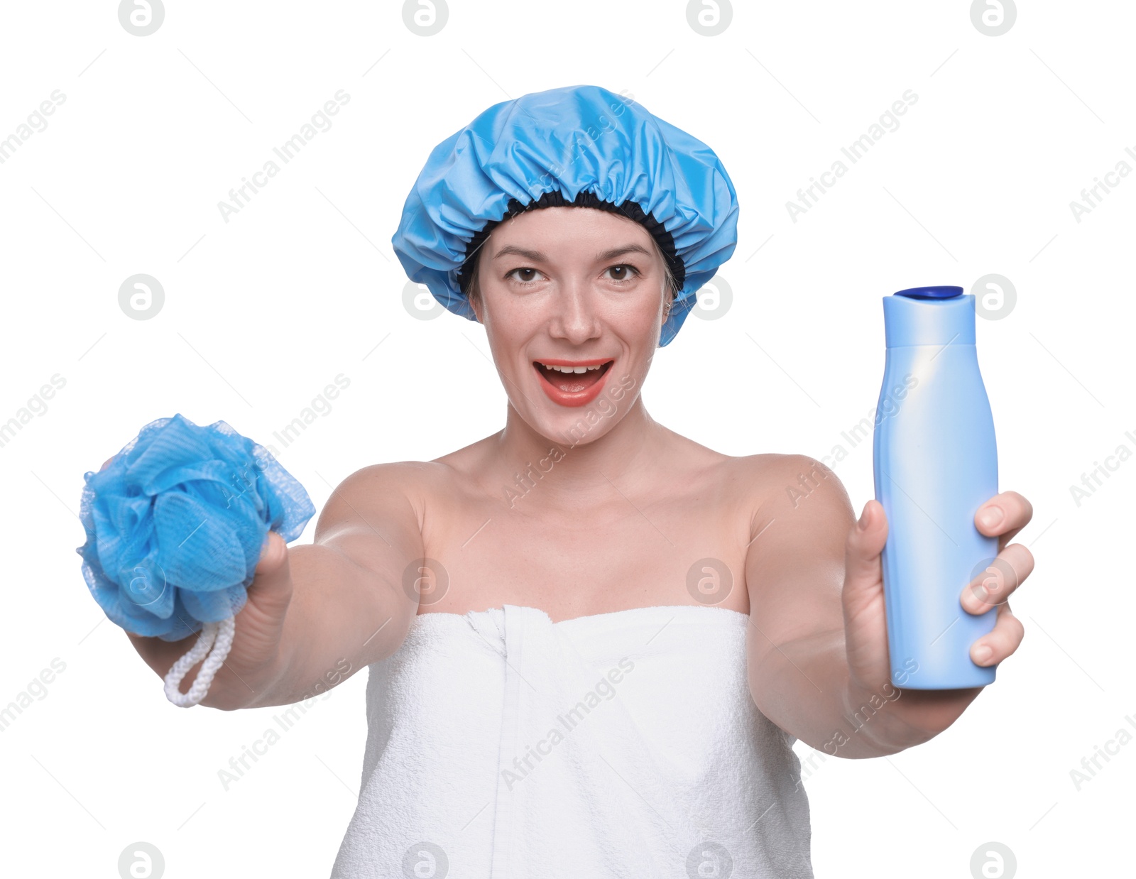 Photo of Woman with blue shower cap, mesh sponge and shampoo on white background