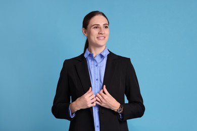 Photo of Portrait of banker on light blue background