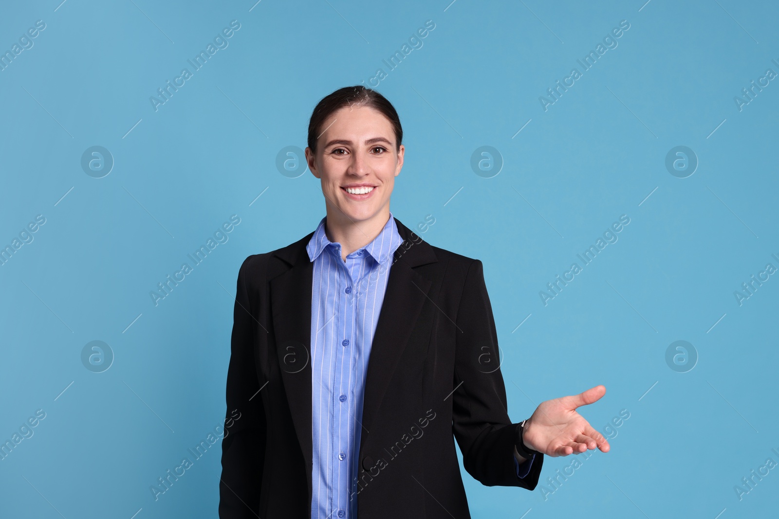 Photo of Portrait of banker on light blue background