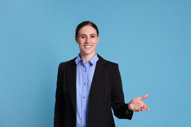 Photo of Portrait of banker on light blue background