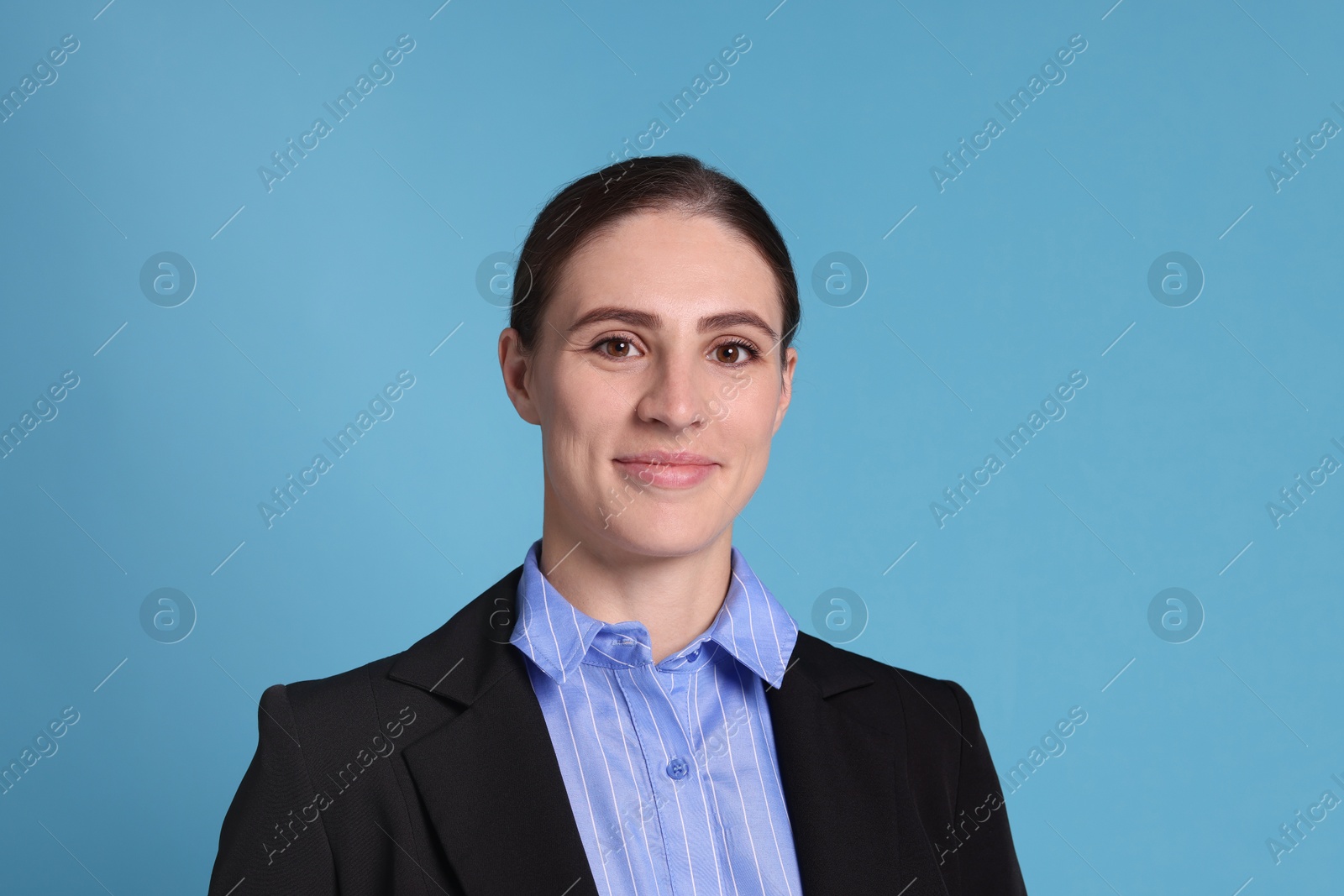 Photo of Portrait of banker on light blue background