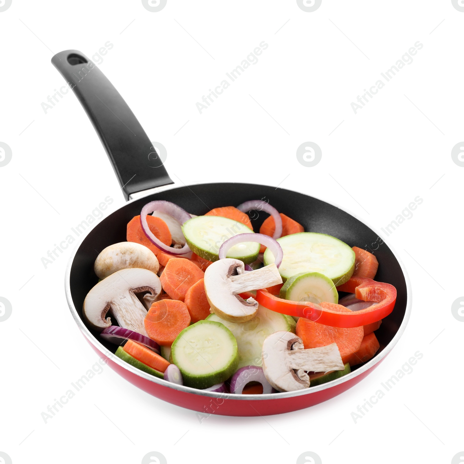 Photo of Frying pan with mix of fresh vegetables and mushrooms isolated on white