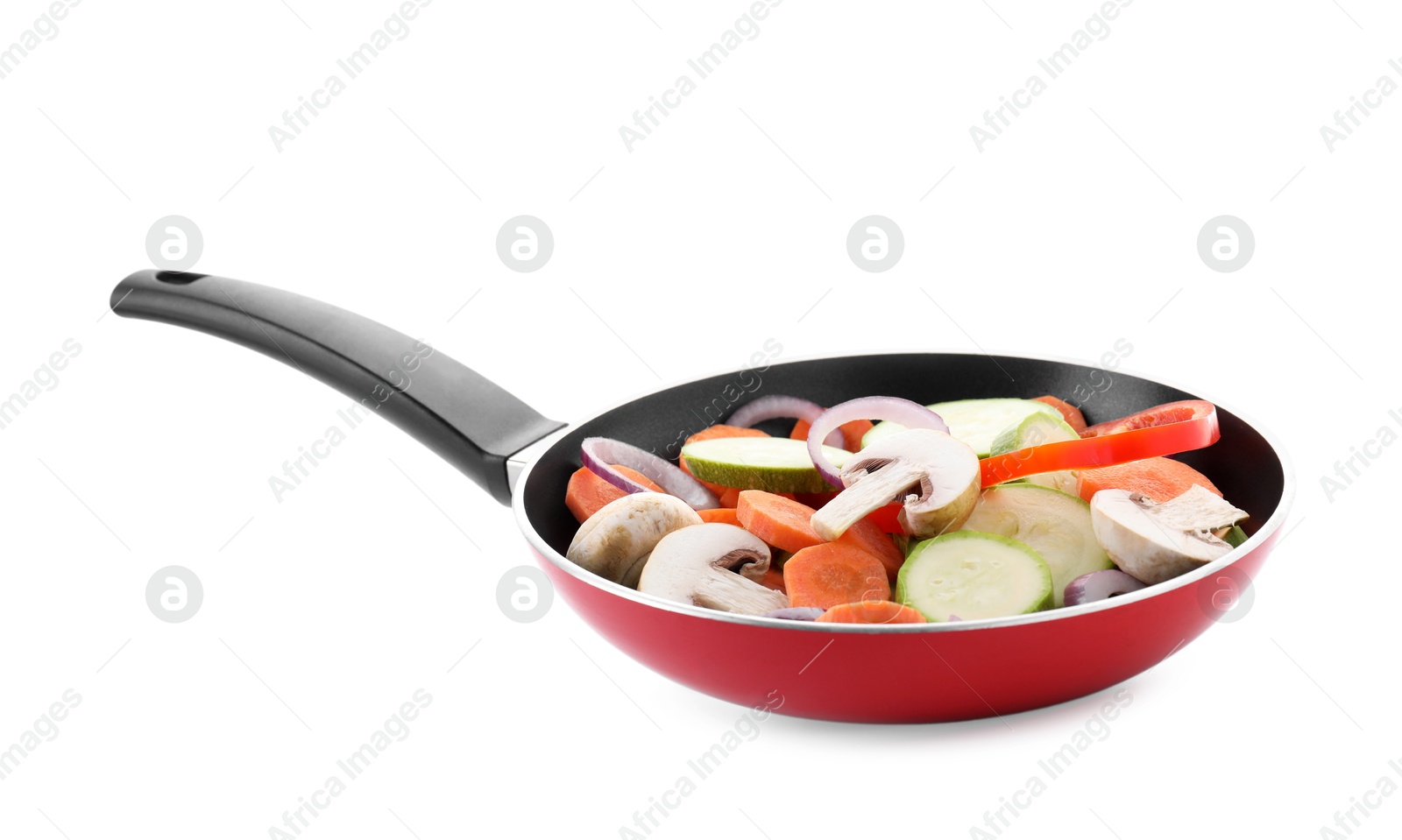 Photo of Frying pan with mix of fresh vegetables and mushrooms isolated on white